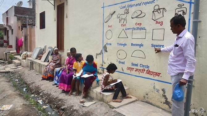 indian-school-paints-village-walls-for-outdoor-covid-19-pandemic-classes.jpg