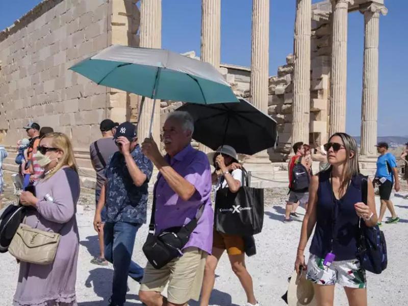 Ακρόπολη, μάσκες, κόσμος, τουρίστες, ήλιος, ζέστη