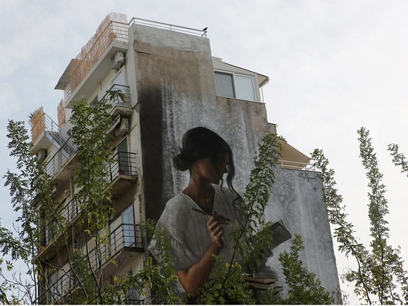 Γκράφιτι σε τοίχο του Μεταξουργείου: «Τόσα πολλά βιβλία, τόσος λίγος χρόνος»