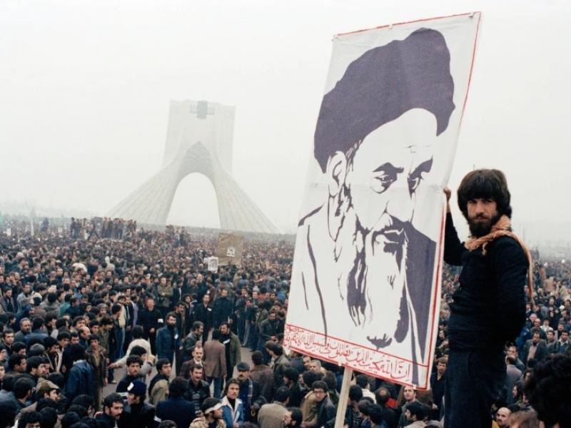 FILE - Iranian protesters demonstrate against Shah Mohammad Reza Pahlavi on Oct. 9, 1978, in Tehran, Iran. (AP Photo)