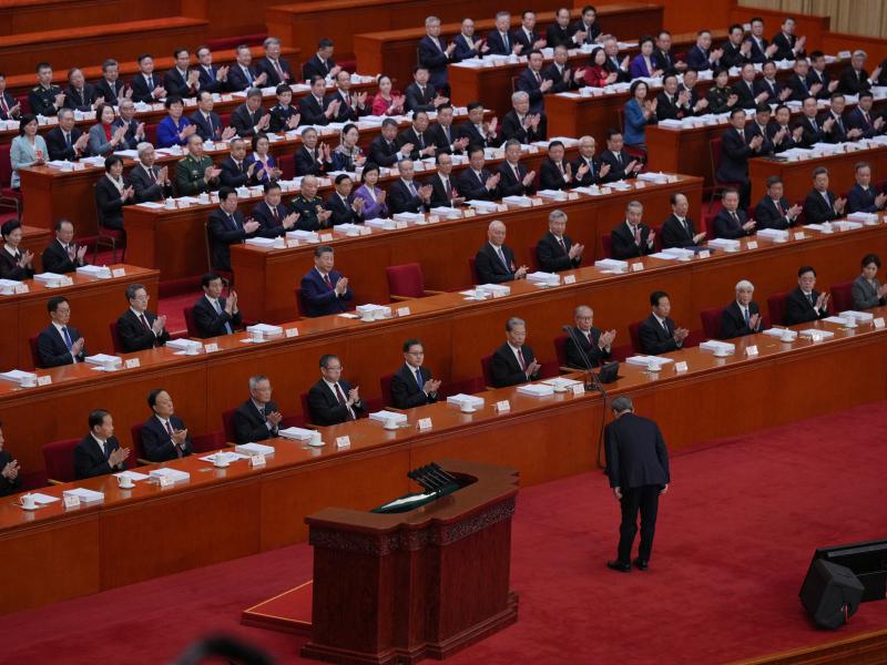 Chinese Premier Li Qiang bows before delivering his report during the opening session of the National People's Congress (NPC) in Beijing, Thursday, March 5, 2026. (AP Photo/Andy Wong)