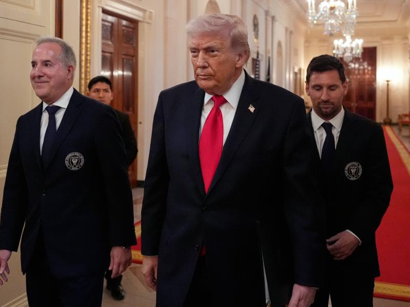 President Donald Trump arrives with Inter Miami CF owner Jorge Mas Santos, left, and Lionel Messi for an event to honor the 2025 Major League Soccer champions Inter Miami CF in the East Room of the White House, Thursday, March 5, 2026, in Washington. (AP Photo/Alex Brandon)