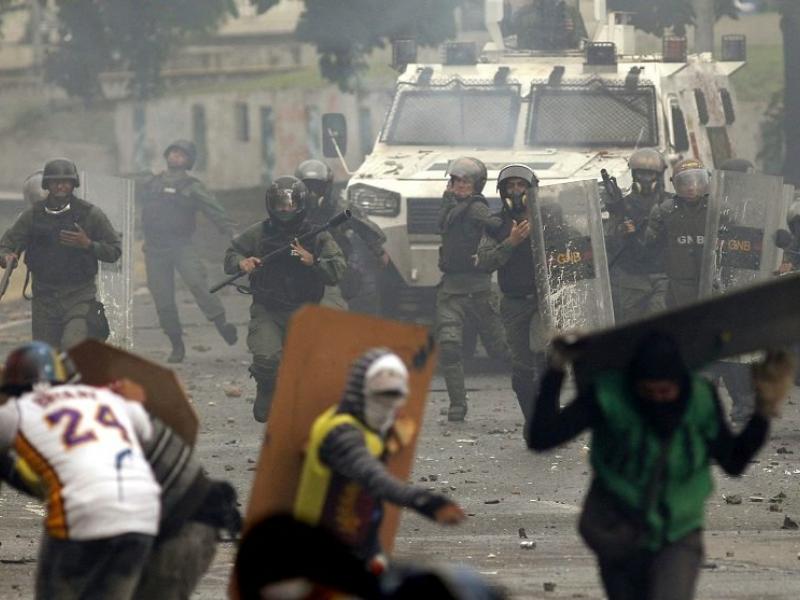 ap-venezuela-protests-1021x557.jpg