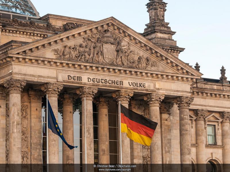 cbpictures_20130420_0008-reichstag_building_with_germany_flag_european_flag_and_the_letting_-dem_deutschen_volke-_german_for_-to_the_german_people-_government_district_berlin_germany_xgaplus.jpg