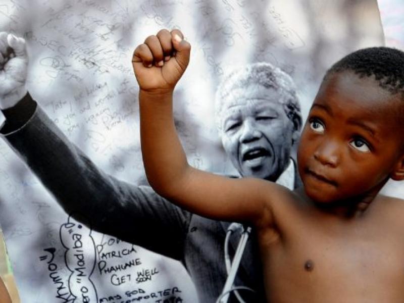 child_imitating_mandela.jpg.size_.xxlarge.promo_.jpg
