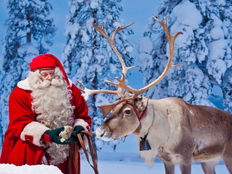 santa-and-reindeer-rovaniemi-1533x1020.jpg