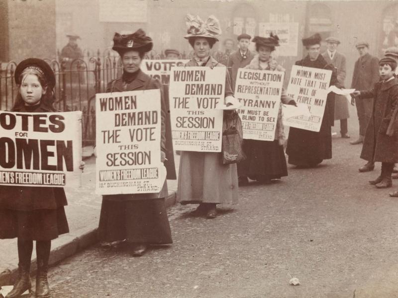 women_stand_in_gutter_for_a_poster_parade_organised_by_the_womens_freedom_league_to_promote_the_suffrage_message_c_museum_of_london.jpg