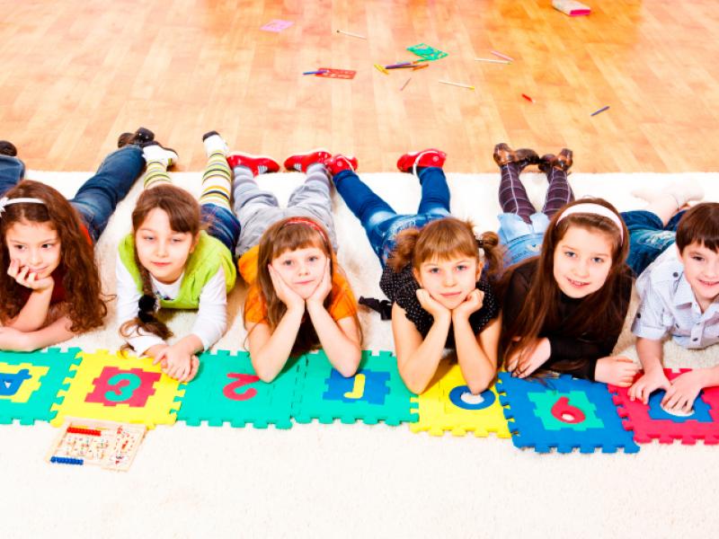 kids-at-school-laying-on-floor-mat_0.jpg