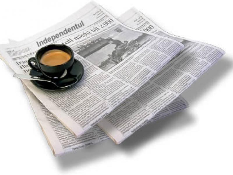 newspapers-and-coffee-cup.jpg
