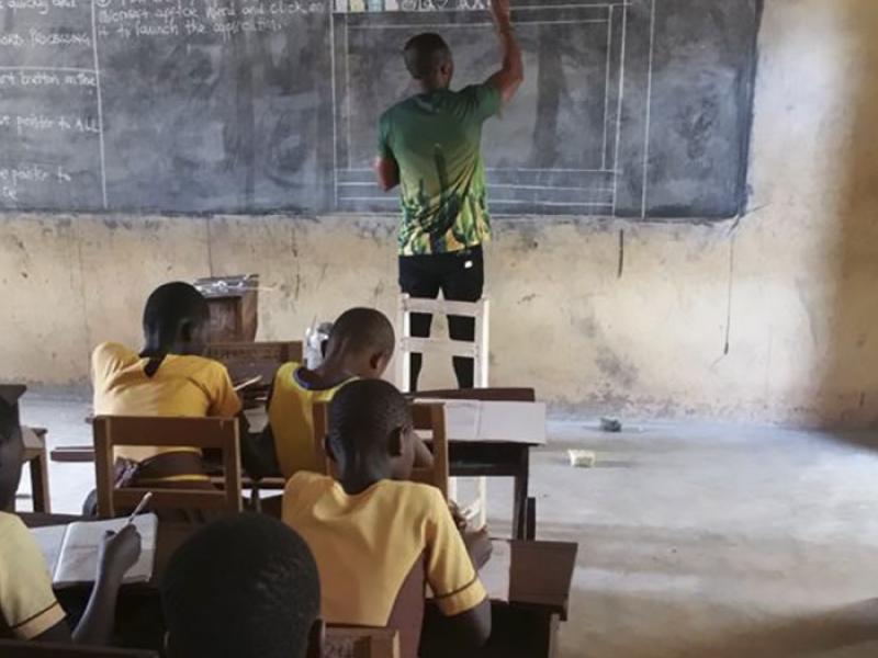 teacher-draws-computer-screen-chalkboard-owura-kwadwo-hottish-ghana-4-5a8fdf8f1c905_700.jpg