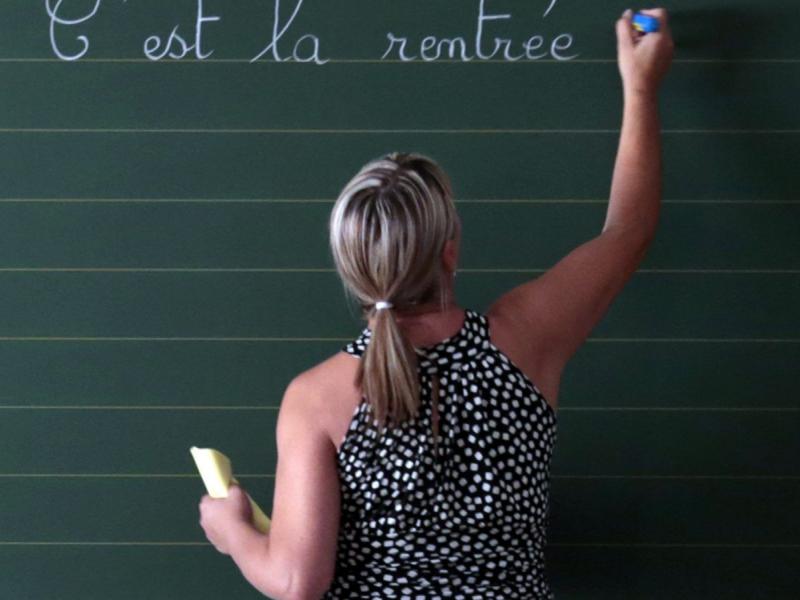 woman-writing-on-blackboard-e1491663469638_1.jpeg