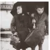 συνομπρελίζεσθαι