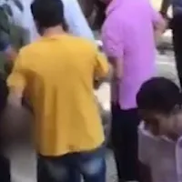 Ο άνδρας με την κίτρινη μπλούζα