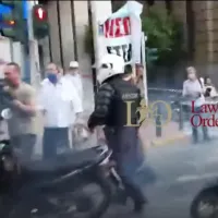 astynomikos syriza