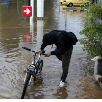 κακοκαιρία, βροχή, Μπάλλος, πλημμύρες δρόμος, ποδήλατο, ποδηλάτης