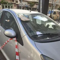 13ο ΓΕΛ ΠΕΙΡΑΙΑ ΕΠΕΣΕ ΣΤΟ ΠΕΖΟΔΡΟΜΙΟ ΚΑΙ ΣΕ ΣΤΑΘΜΕΥΜΕΝΟ ΑΜΑΞΙ ΜΕΡΟΣ ΤΗΣ ΜΕΤΟΠΗΣ ΑΠΟ ΤΗΝ ΤΑΡΑΤΣΑ ΤΟΥ ΣΧΟΛΕΙΟΥ