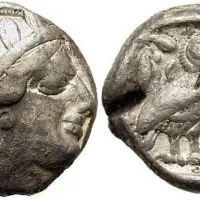 νομισ
