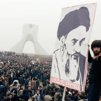 FILE - Iranian protesters demonstrate against Shah Mohammad Reza Pahlavi on Oct. 9, 1978, in Tehran, Iran. (AP Photo)