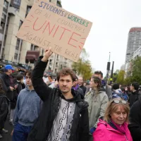 Protesters take part in a demonstration against rising living costs in Paris, Saturday, Oct. 24, 2026. (AP PhotoThibault Camus)