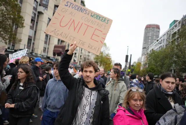 Protesters take part in a demonstration against rising living costs in Paris, Saturday, Oct. 24, 2026. (AP PhotoThibault Camus)